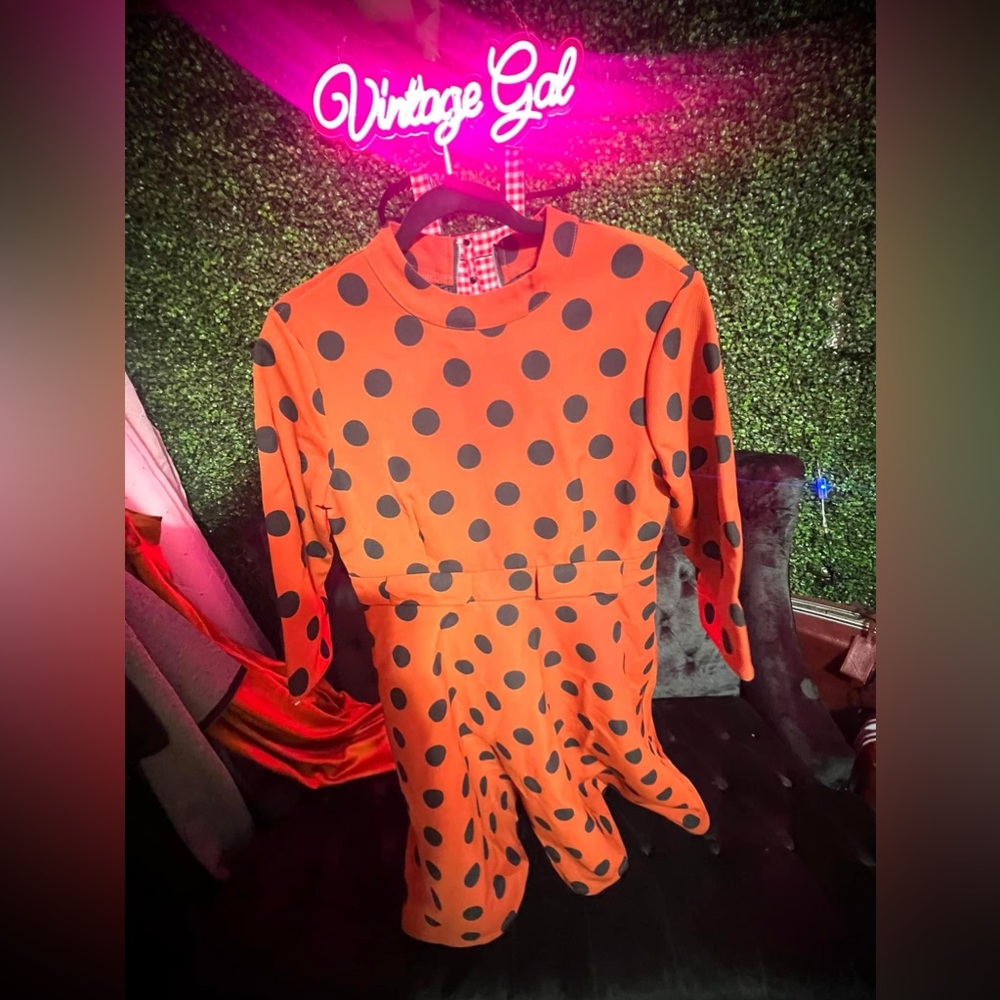 1960s style orange polka dot dress.